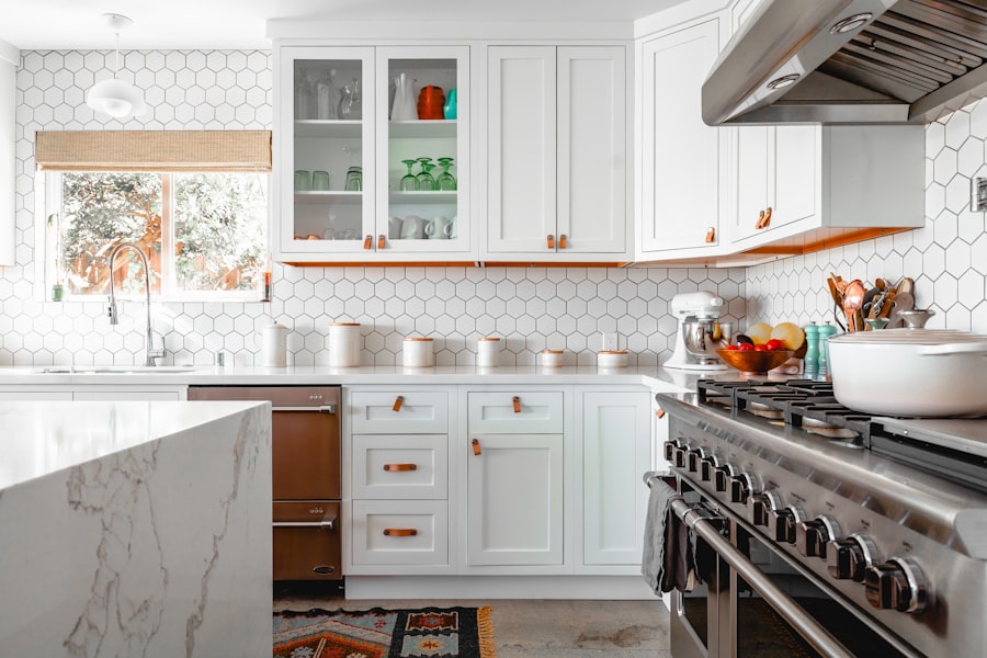 Bright, newly remodeled kitchen with white cabinets and a large island